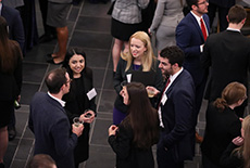 Students and alumni talking in Star Commons